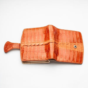 Portefeuilles pour femmes en peau de crocodile orange bicolore