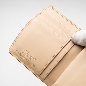Portefeuilles pour femmes en peau de crocodile orange bicolore