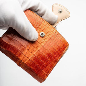 Portefeuilles pour femmes en peau de crocodile orange bicolore