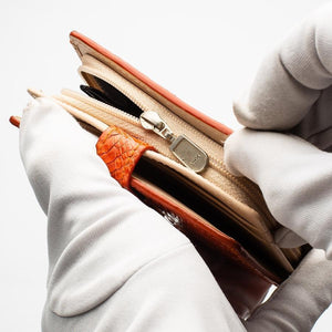 Portefeuilles pour femmes en peau de crocodile orange bicolore